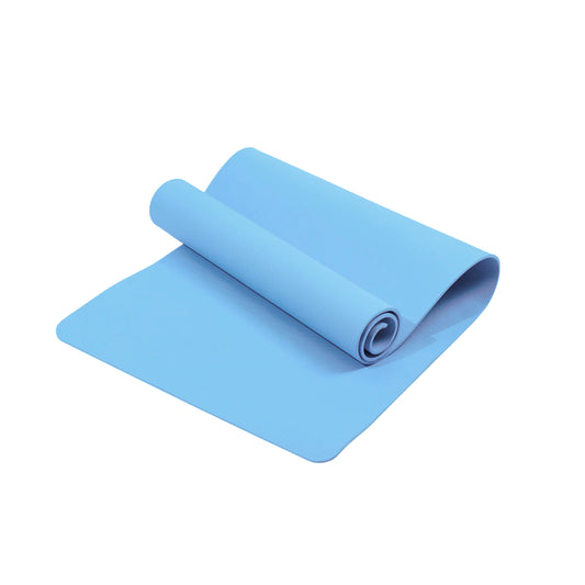 Blue yoga mat rolled up on a white background