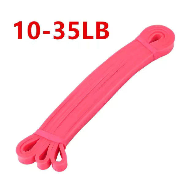 Pink resistance band with weight capacity text on a white background