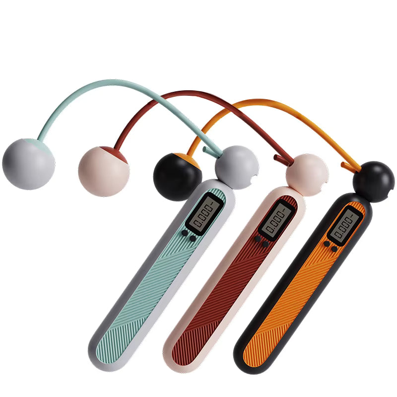 Three jump ropes with colorful handles on a white background